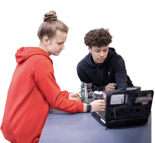 Two PLTW students collaborating on hands-on STEM activity