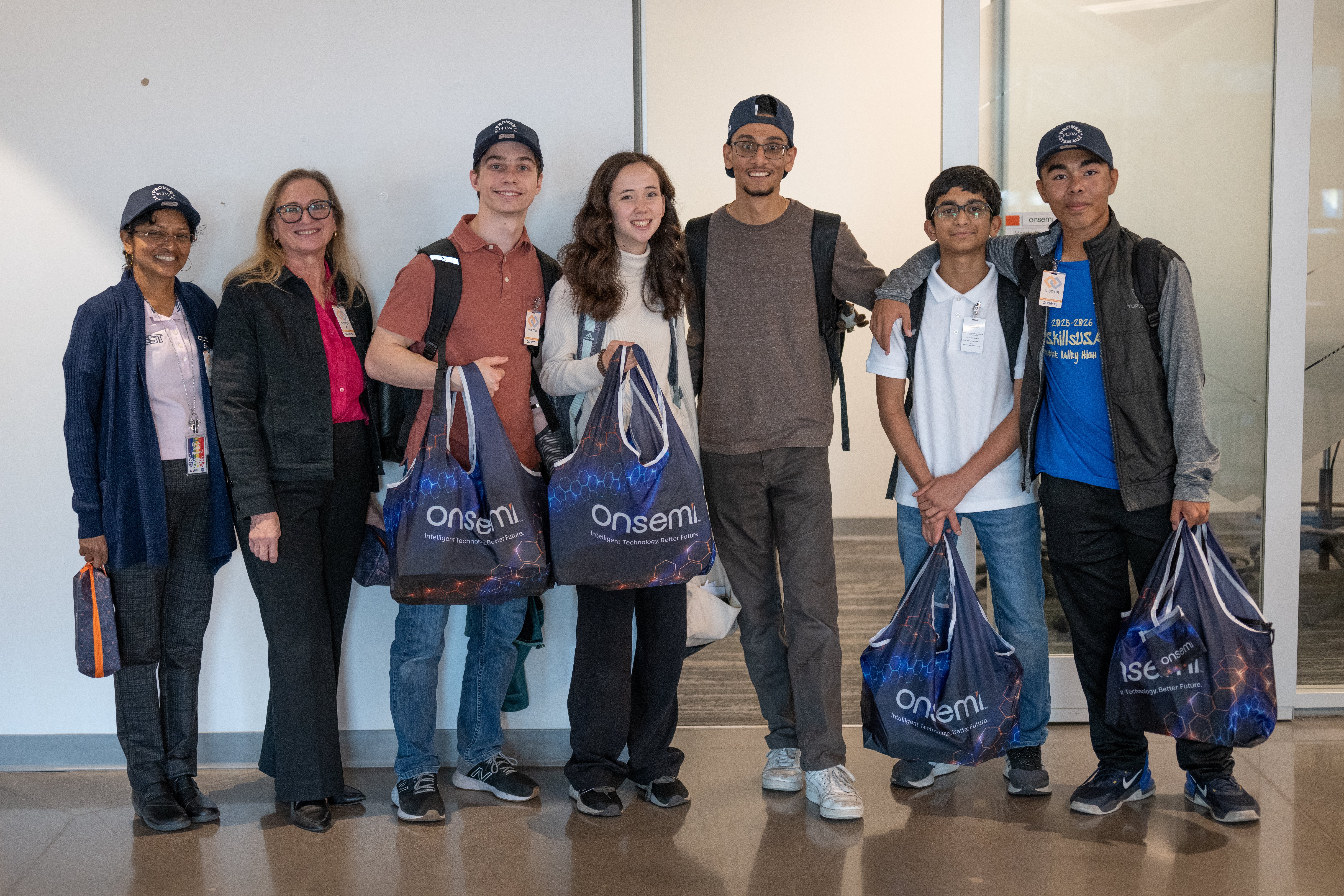 PLTW Engineering students and teachers from Paradise Valley High School in Phoenix, Arizona stand to…