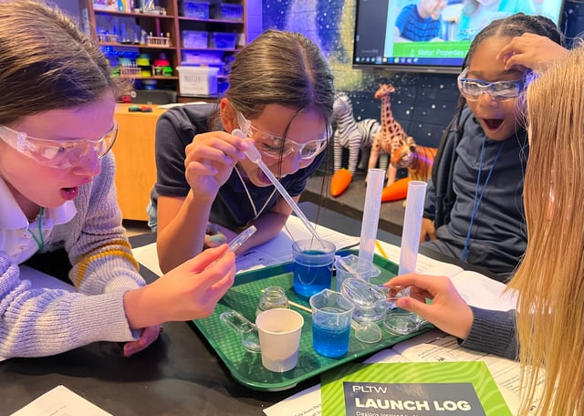 Middle School Students Learning in Lab Environment