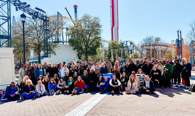 Pictured are PLTW educators straddling the state line at Carowinds. North Carolina educators are on the right and South Carolina educators are on the left side.