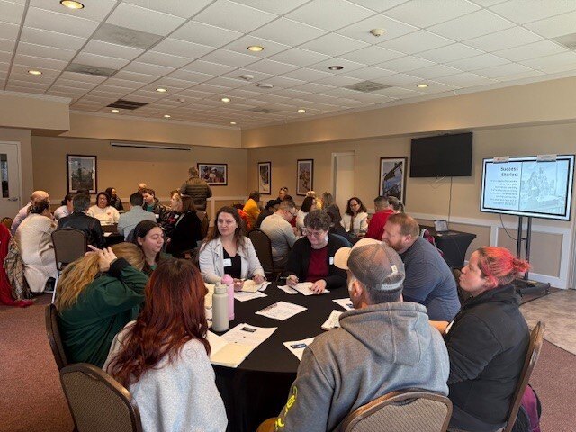 Pictured are PLTW Gateway teachers engaging in a best practices discussion during a breakout session.&nbsp;
