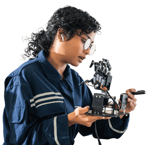 Female PLTW Engineering student working with robotics.