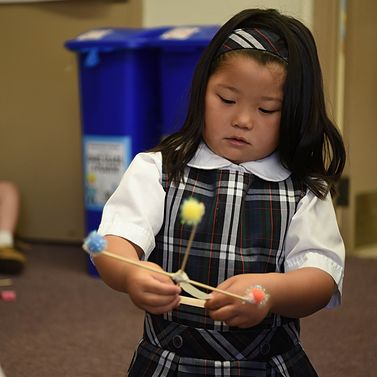 PLTW launch student engaged in a hands on STEM learning  activity. 