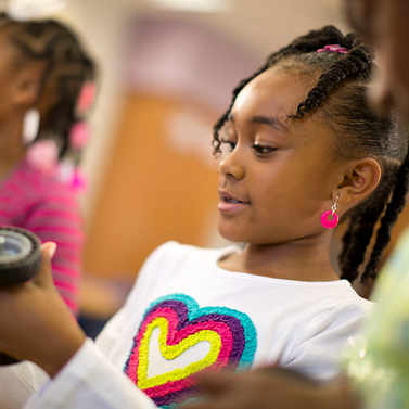 A PLTW Launch student engaged in an activity