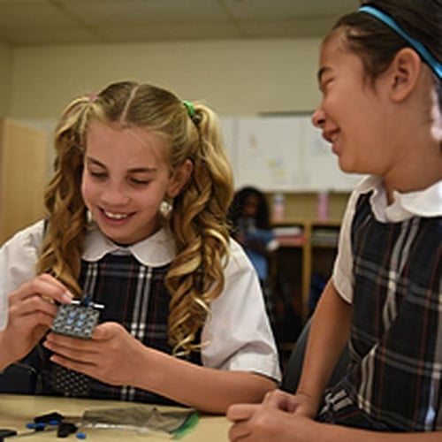 PLTW launch students engaged in an activity